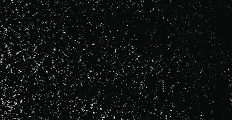 Obraz premium Small uneven spots and particles of debris. Abstract vector texture. Distressed uneven background. Grunge texture overlay with fine grains isolated on white background. Vector illustration. EPS10.