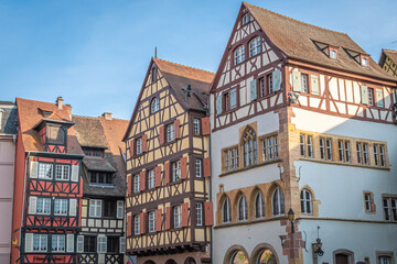 Traditional old alsatian houses in Colmar in Alsace in the department of Haut-Rhin of the Grand Est region of France - Powered by Adobe