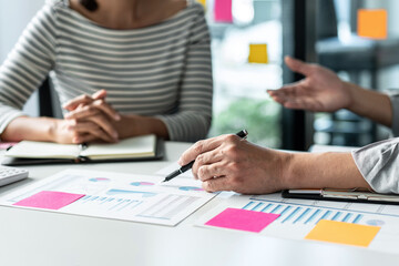 Business team colleagues consultation and discussion marketing plan meeting on the financial report...