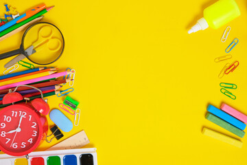 School supplies and stationery yellow background.Preparing child for school.