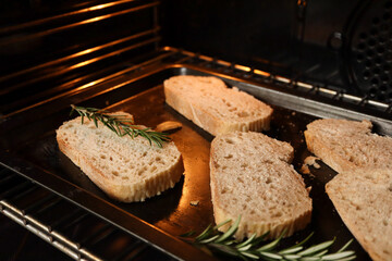 Slices of bread in an oven