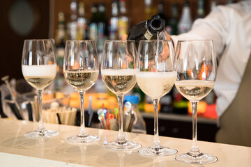 glasses with prosecco on the bar
