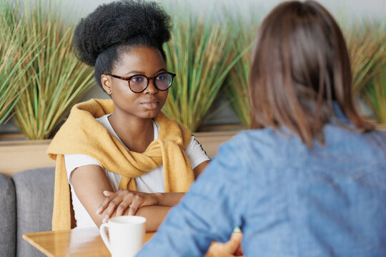 moral support and mental health, African American woman supporting a colleague in a difficult situation, words of support or help with advice, communication between patient and psychologist, spiritual