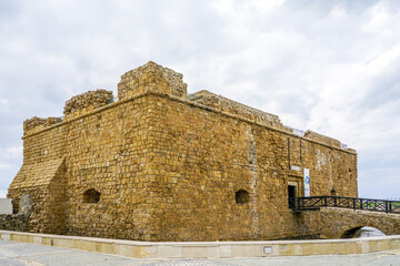 Fototapeta na wymiar The Medieval Castle or Fort guarding the harbor of Paphos, Cyprus