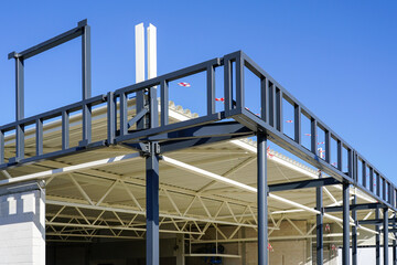 A new modern store building steel and concrete blocks frame is under construction