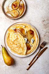 French Crepe with blue cheese and caramelized pears. Sweet and savoury homemade crepes pancakes...