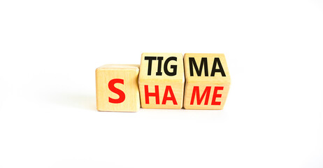 Stigma or shame symbol. Concept words Stigma or Shame on wooden cubes. Beautiful white table white...