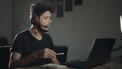 University professor teaching online classes from home. Young video conference tutor. Concept of ease of learning through technology