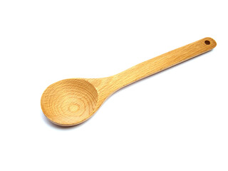Wooden spoon on an isolated white background.