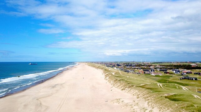 aerial view of the long beach and ocean in jutland near Vrist, harbo&oslash;re ,lemvig, denmark