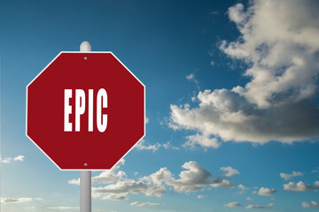 Red stop sign with the word Epic on a blue sky background.