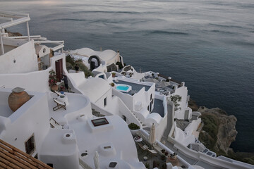 View of the whitewashed and picturesque small houses and hotels of Oia Santorini
