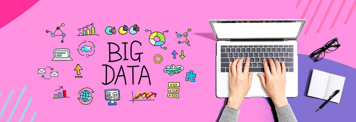 Big data theme with person using a laptop computer