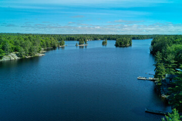 Aerial summer shot of some docks on Healey Lake in Bracebridge Ontario, Canada