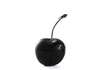 Ripe raw cherry with stem closeup in black and white with wet water droplets, isolated on white...