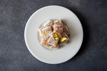 Traditional pistachio Turkish delight in a plate
