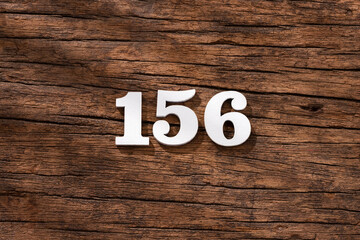 Number 156 - piece on rustic wood background