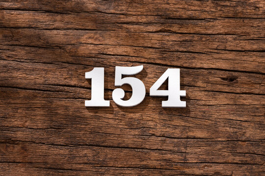 Number 154 - piece on rustic wood background