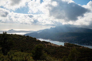 Touristic route D141 road from La Ciotat to Cassis, panoramic view on harbour of Cassis, blue sea, limestone's cliffs and green pine forest, vacation in Provence, France