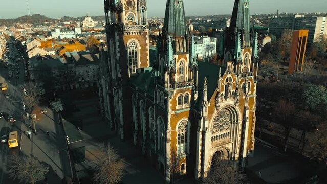 4k Aerial footage from flying drone over historical center of Church of St. Olga and Elizabeth old Catholic Cathedral in town Lviv, Ukraine. landmarks, architecture of ancient european city