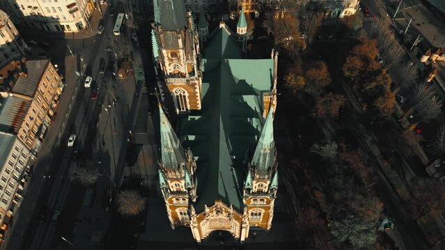 drone aerial view over dome, crosses and spires of Church of St. Olga and Elizabeth old Catholic Cathedral in historical center Lviv city, Ukraine. landmarks and architecture of ancient european town