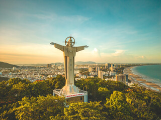 Top view of Vung Tau with statue of Jesus Christ on Mountain . the most popular local place. Christ the King, a statue of Jesus. Travel concept. © Dong Nhat Huy