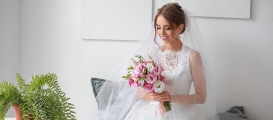 Pretty young bride with bouquet of flowers at home. Banner for design
