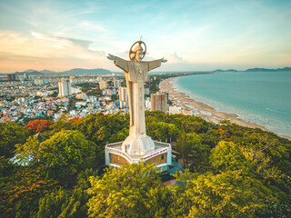 Top view of Vung Tau with statue of Jesus Christ on Mountain . the most popular local place. Christ...