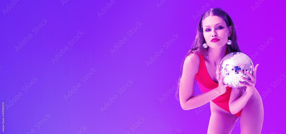 Poster Fashionable young woman holding disco ball on color background with space for text