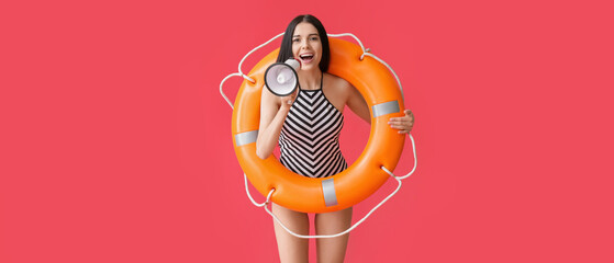 Female beach rescuer with lifebuoy and megaphone on red background