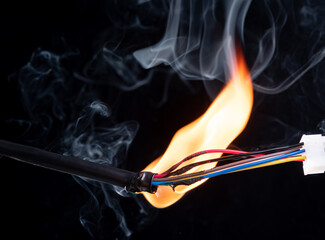 Electric cable wire broken or torn, power energy circuit, burning fire flame, connection break on...