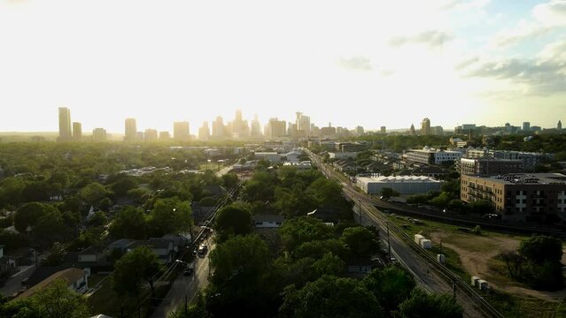Aerial footage with Downtown Buildings in the Horizon Sunset