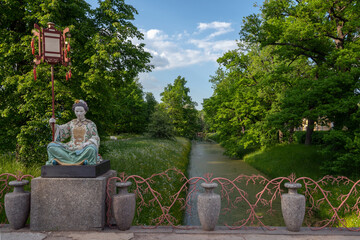 View of the Large Chinese Bridge in Alexander Park in Tsarskoye Selo on a sunny summer day,...