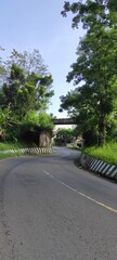 A winding and narrow highway in the Pangandaran area, Indonesia