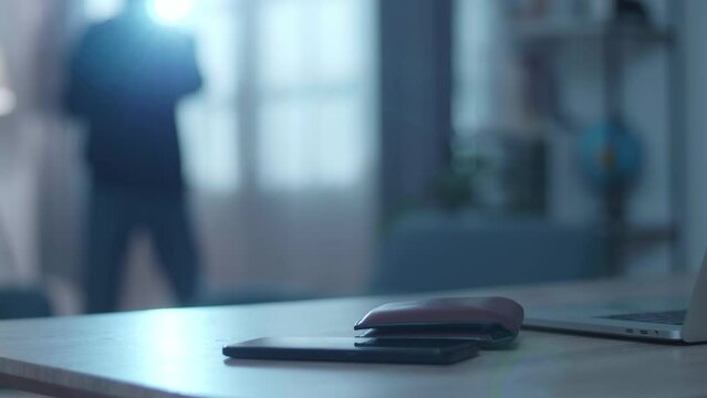 Closed Circuit Television Camera Is Working While A Thief Man With Flashlight Walking In Someone'S House
