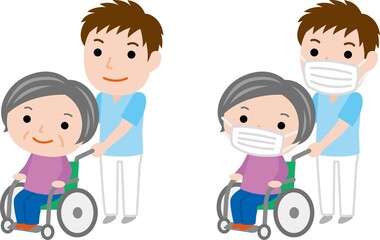 車椅子のおばあさんと男性介護士