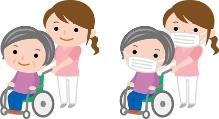 車椅子のおばあさんと女性介護士