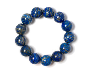 Lapis Lazuli Jewel or gems bracelet on white background. Collection of natural gemstones accessories. Studio shot