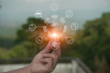 Light bulb Energy saving green nature background