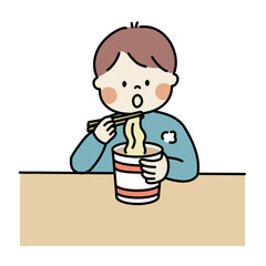 カップ麺を食べる男の子