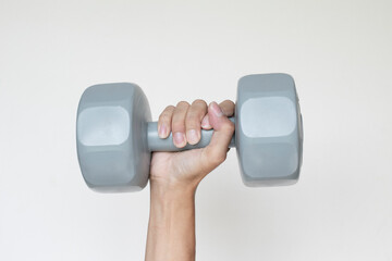 hand holding dumbbell. Sport and healthy lifestyle concept