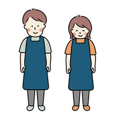 エプロンを着ている男女