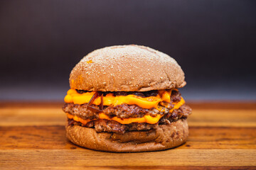 Delicious double beef burger with cheddar cheese and caramelized onions. beef burger. Australian...