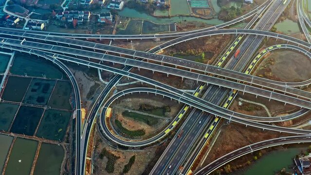 Aerial footage of highway junction. multi storey highway overpass. Transportation concept. Hangzhou, China.