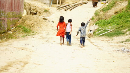 rural kids walking at street