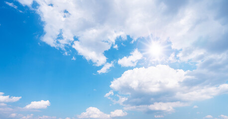 Naklejka na ściany i meble Sun in blue sky with cloud.