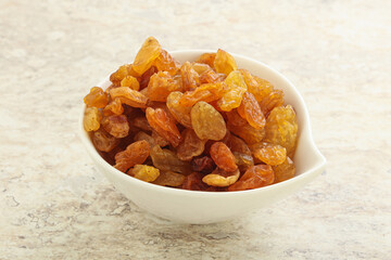 Sweet yellow raisin in the bowl