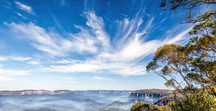 Windy Sky Over A Foggy Canyon Of Blue Mountains, Australia