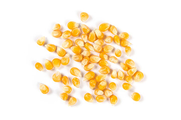 pile of dry corn isolated on white background.Unpopped popcorn