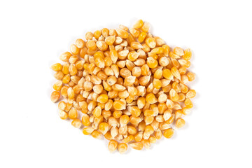 pile of dry corn isolated on white background.Unpopped popcorn